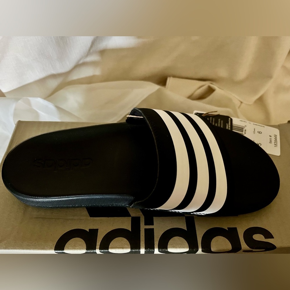 Adidas Adilette Comfort Slides – Black/White – NWT
Women Size 5